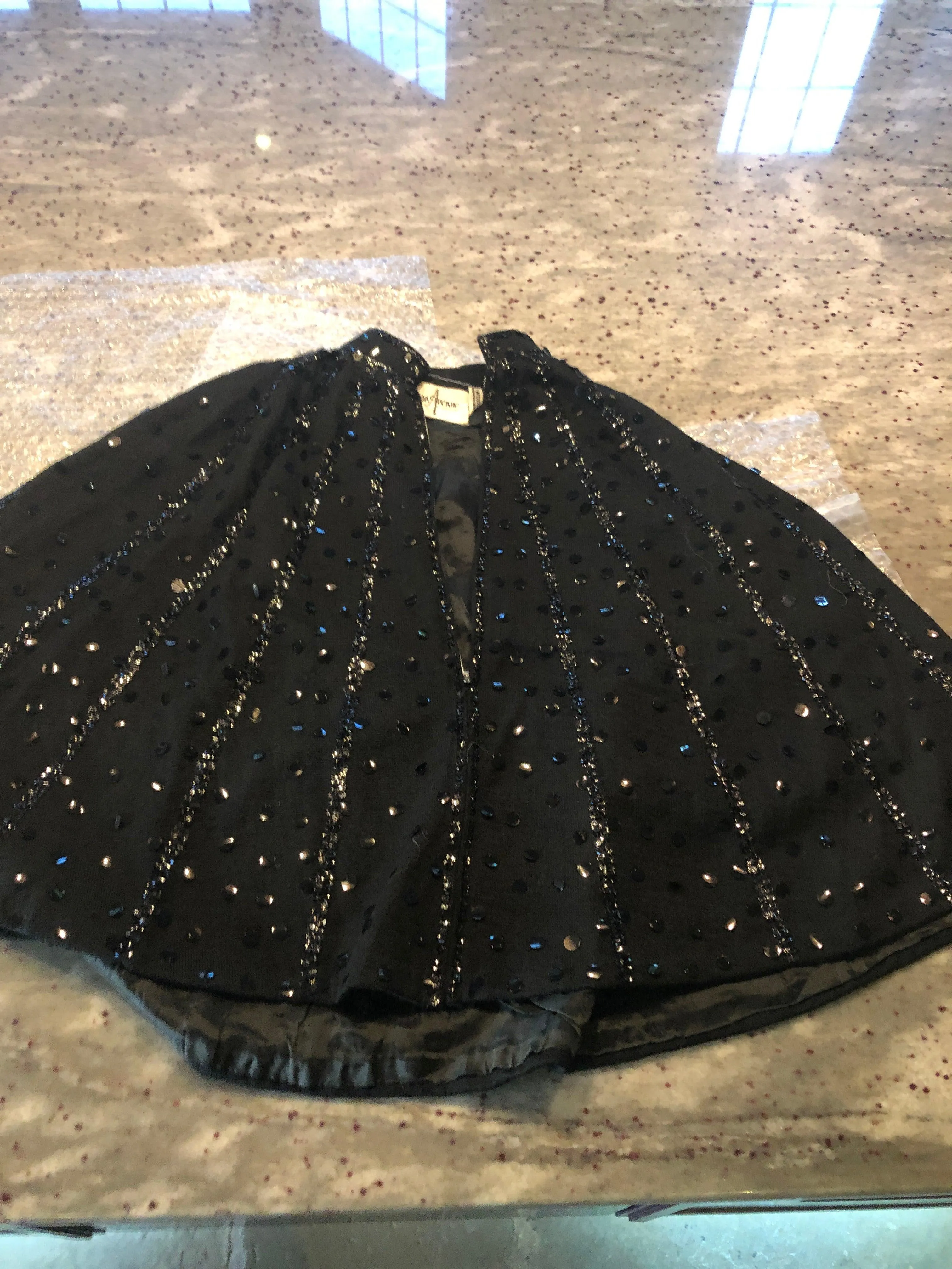 Madison Avenue black and sequin cape