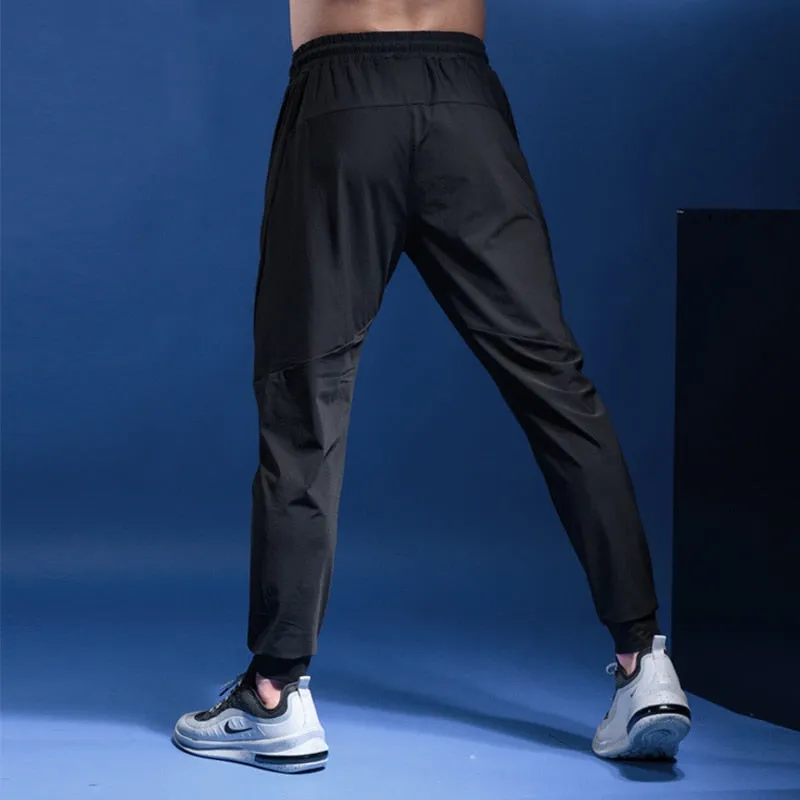 Mens Joggers Casual Pants Fitness Men Sportswear Tracksuit Bottoms Skinny Sweatpants Trousers Gyms Casual Elastic Pants