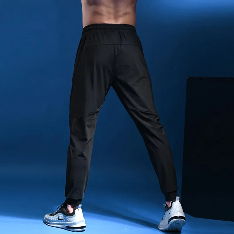 Mens Joggers Casual Pants Fitness Men Sportswear Tracksuit Bottoms Skinny Sweatpants Trousers Gyms Casual Elastic Pants